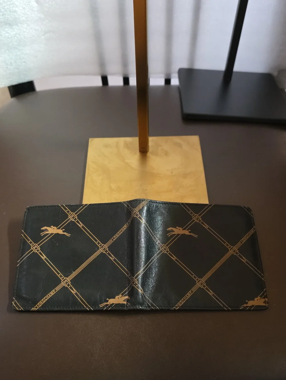 Longchamp Black and Gold Printed Leather Wallet